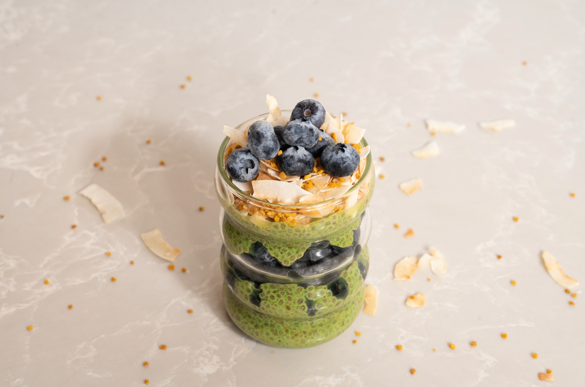 Delicious Vanilla Bean Matcha Chia Pudding in Glass Cup