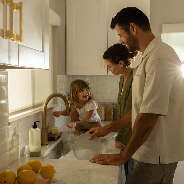 Family using Probiotic Hand Soap to Wash Dishes Together